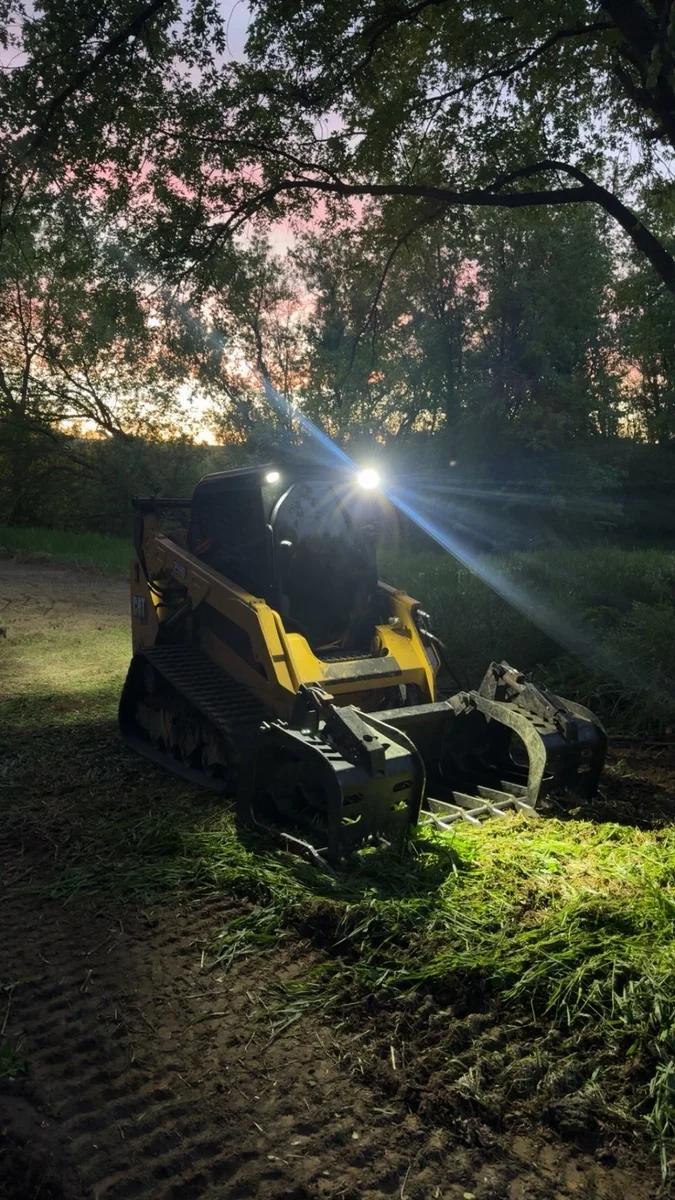 Working through the last light of the day.